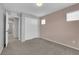 Neutral bedroom with a closet, carpet, and two-tone paint at 9024 Hazy Haven Ct, Las Vegas, NV 89149