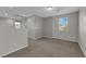 Bright, airy bonus room featuring recessed lighting, neutral walls and carpet, and a window to let the sun shine in at 9024 Hazy Haven Ct, Las Vegas, NV 89149