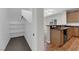 Walk-in pantry offers plenty of shelving for storage, with views of the kitchen and living room at 9024 Hazy Haven Ct, Las Vegas, NV 89149