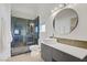 Modern bathroom featuring a frameless glass shower and vessel sink at 925 Mandolin Way, North Las Vegas, NV 89032
