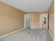 Spacious bedroom with neutral carpet, and two doorways, creating a bright and comfortable retreat at 925 Mandolin Way, North Las Vegas, NV 89032