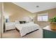 Cozy bedroom with neutral walls, plush carpet, and stylish decor at 925 Mandolin Way, North Las Vegas, NV 89032