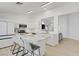 Modern kitchen with white cabinets, stainless steel appliances, and a marble island at 925 Mandolin Way, North Las Vegas, NV 89032
