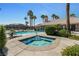 Community hot tub offering ample seating, landscaping, and clear blue water at 9270 Apache Springs Dr, Las Vegas, NV 89117