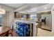 View of the kitchen featuring stainless steel appliances, granite countertops, and a breakfast bar at 9270 Apache Springs Dr, Las Vegas, NV 89117