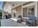 Relaxing covered patio with furniture and outdoor grill at 9270 Apache Springs Dr, Las Vegas, NV 89117