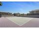 The tennis court offers a delightful outdoor space for recreation, set against a backdrop of well-maintained residences at 9270 Apache Springs Dr, Las Vegas, NV 89117