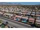 Expansive aerial view highlighting this beautiful home with a private backyard pool and neighborhood at 9709 Casper Peak Ct, Las Vegas, NV 89117
