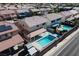 Aerial view of home featuring a backyard pool and covered patio area for outdoor living at 9709 Casper Peak Ct, Las Vegas, NV 89117