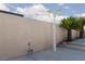 Backyard featuring a tall privacy wall and lovely landscaping at 9709 Casper Peak Ct, Las Vegas, NV 89117