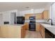 Functional kitchen offering modern appliances, center island, and plenty of counter space at 9709 Casper Peak Ct, Las Vegas, NV 89117