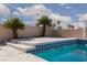 Pool with stylish blue tile trim and palm trees, perfect for outdoor enjoyment at 9709 Casper Peak Ct, Las Vegas, NV 89117