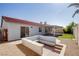 Great backyard featuring a covered patio area and built in seating at 1006 Blue Lantern Dr, Henderson, NV 89015