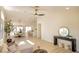 Open-concept living space with wood floors, a modern kitchen, and a dining area perfect for entertaining guests at 1006 Blue Lantern Dr, Henderson, NV 89015
