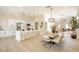 Open-concept design integrating the kitchen, dining, and living areas, perfect for modern living and entertaining at 1006 Blue Lantern Dr, Henderson, NV 89015