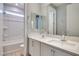 This bathroom features a double sink vanity and shower-tub combo at 10342 Kesington Dr, Las Vegas, NV 89135