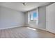 Bright bedroom with large window and neutral color palette at 10342 Kesington Dr, Las Vegas, NV 89135