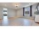 Living room boasts vinyl floors, recessed lighting, and a wet bar area with stainless steel appliances and cabinets at 10342 Kesington Dr, Las Vegas, NV 89135