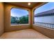 Private balcony with decorative railings offering scenic neighborhood views at 11844 Mino Rio Ave, Las Vegas, NV 89138