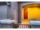 Inviting front entrance with brick walkway, arched doorway, and exterior lighting at 11844 Mino Rio Ave, Las Vegas, NV 89138