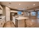 Well-equipped kitchen with stainless steel appliances, a large island, and ample counter space at 11844 Mino Rio Ave, Las Vegas, NV 89138