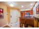 Convenient kitchenette with sleek countertops, bar seating, and modern appliances, perfect for a comfortable lifestyle at 125 E Harmon Ave # 2801 & 2803, Las Vegas, NV 89109