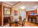 Comfortable living area includes a dining table with seating for four and sleek built-in cabinets at 125 E Harmon Ave # 2801 & 2803, Las Vegas, NV 89109