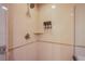 Shower with wall shelves and toiletries at 125 E Harmon Ave # 2801 & 2803, Las Vegas, NV 89109