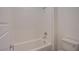 Bathroom showcasing a clean white tub with tile surround, perfect for relaxation and easy cleaning at 139 Aqua Commons Ln, Henderson, NV 89015