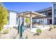 A community picnic area offers residents a shady place to sit and relax outdoors at 139 Aqua Commons Ln, Henderson, NV 89015