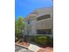 Exterior of a two-story building featuring a ramp, large windows, and a second story balcony at 1500 Cardinal Peak Ln # 201, Las Vegas, NV 89144