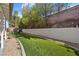 Expansive backyard with lush artificial turf, providing a green and inviting space for recreation and relaxation at 1619 Abby Ave, Henderson, NV 89014