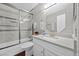 Modern bathroom with tub-shower combination, new vanity, stylish fixtures, and a comfort height toilet at 1619 Abby Ave, Henderson, NV 89014