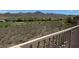 Desert backyard landscaping overlooking golf course and mountains at 18 Brookridge Dr, Henderson, NV 89052