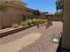 Desert backyard featuring landscaping and plants at 18 Brookridge Dr, Henderson, NV 89052