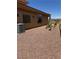 Home exterior features desert landscaping with air conditioning unit at 18 Brookridge Dr, Henderson, NV 89052