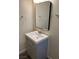 Bathroom vanity with a framed mirror, modern fixtures, and ample storage at 1809 Lamplighter Ln, Las Vegas, NV 89104