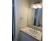 Bathroom featuring a vanity with a mirror and neutral color scheme at 1809 Lamplighter Ln, Las Vegas, NV 89104