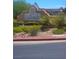 La Posada community entrance sign featuring lush landscaping with desert plants and decorative stones on a sunny day at 1908 Rio Canyon Ct # 105, Las Vegas, NV 89128