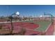 Outdoor basketball courts featuring multiple hoops and seating areas for recreational activities at 2084 Airy Petals Walk, Henderson, NV 89044