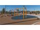 Neighborhood playground with colorful swing sets and cushioned surfaces, designed for recreation and enjoyment at 2084 Airy Petals Walk, Henderson, NV 89044