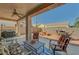 This outdoor patio space is ideal for gatherings, and relaxation, perfect for enjoying the backyard at 2217 Merrimack Valley Ave, Henderson, NV 89044
