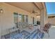 Charming covered patio is perfect for outdoor lounging and relaxation, a true outdoor oasis at 2217 Merrimack Valley Ave, Henderson, NV 89044