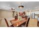 Traditional dining room featuring a wood table, upholstered chairs, and an ornate chandelier at 2217 Merrimack Valley Ave, Henderson, NV 89044
