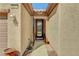 Inviting covered entryway leading to an attractive front door with decorative glass accents at 2217 Merrimack Valley Ave, Henderson, NV 89044