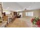 Open-concept living space featuring tile flooring, ample natural light, and a dining area at 2217 Merrimack Valley Ave, Henderson, NV 89044