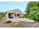 Expansive backyard showcasing a covered patio and low-maintenance landscaping, perfect for outdoor living at 2766 Mintlaw Ave, Henderson, NV 89044