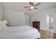 Comfortable bedroom featuring wood-look floors and a ceiling fan at 2766 Mintlaw Ave, Henderson, NV 89044