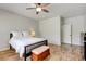 Bedroom featuring a ceiling fan, natural light, and wood-look floors, creating a cozy retreat at 2766 Mintlaw Ave, Henderson, NV 89044