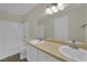 Bathroom showcases a dual-sink vanity, large mirror, and a shower-tub combo at 3182 Tarpon Dr # 204, Las Vegas, NV 89120